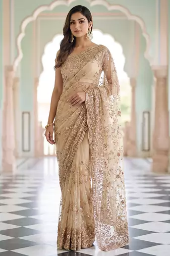 Champagne gold embroidered net saree