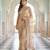 Champagne gold embroidered net saree