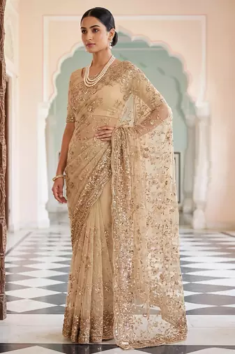 Champagne gold embroidered net saree