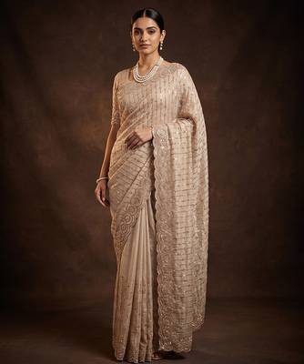 Champagne gold embroidered soft georgette saree 1