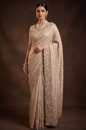 Champagne gold embroidered soft georgette saree