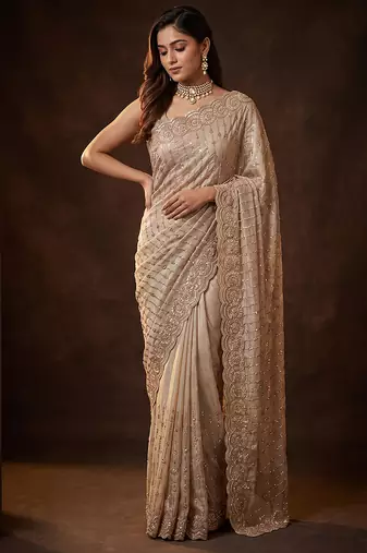 Champagne gold embroidered soft georgette saree