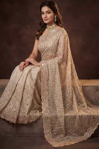 Champagne gold embroidered soft georgette saree