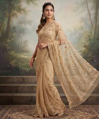 Beige embroidered net saree 2