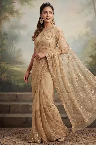 Beige embroidered net saree