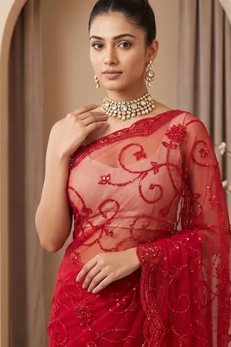 Red embroidered net saree