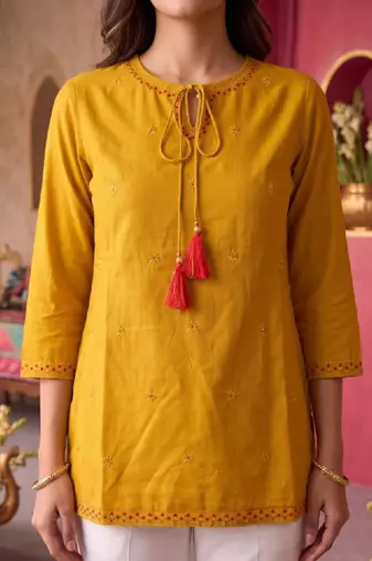 Women embellished thread work kurta