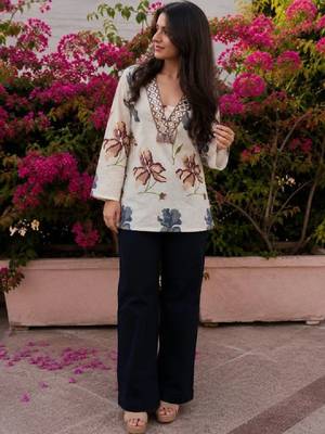 Women floral printed flared sleeves mirror work floral kurta 1