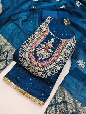 Blue silk  embroidered unstitched dressmaterials 3 pair top bottom dupptaa 2