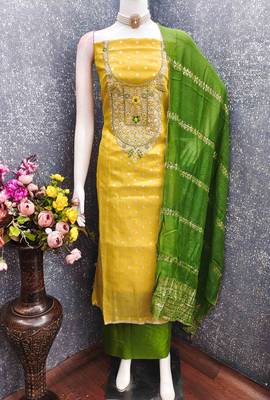 Yellow silk embroidered unstitched dressmaterials 3 pair top bottom dupptaa 3
