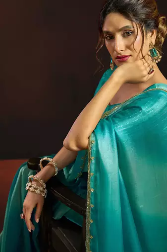 Shaded sky blue satin beads work border party wear saree