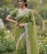 olive color embroidery work with cut work border and havy daimond work silk blend saree