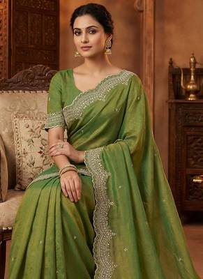 olive color embroidery work with cut work border and havy daimond work silk blend saree 2