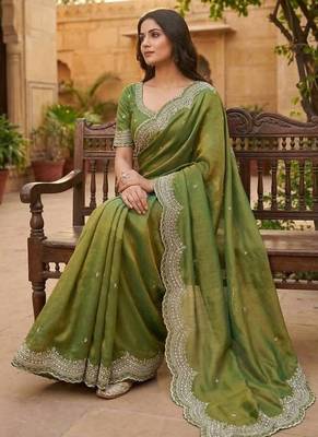 olive color embroidery work with cut work border and havy daimond work silk blend saree 3