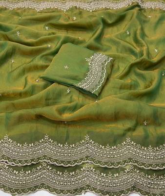 olive color embroidery work with cut work border and havy daimond work silk blend saree 4