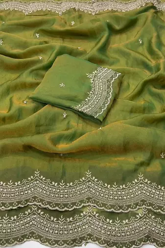 olive color embroidery work with cut work border and havy daimond work silk blend saree