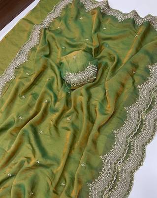 olive color embroidery work with cut work border and havy daimond work silk blend saree 5