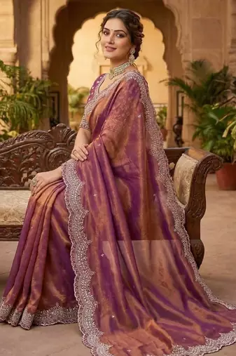 pink color embroidery work with cut work border and havy daimond work silk blend saree