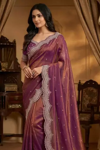 pink color embroidery work with cut work border and havy daimond work silk blend saree