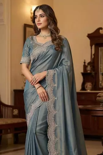 sky blue color embroidery work with cut work border and havy daimond work silk blend saree