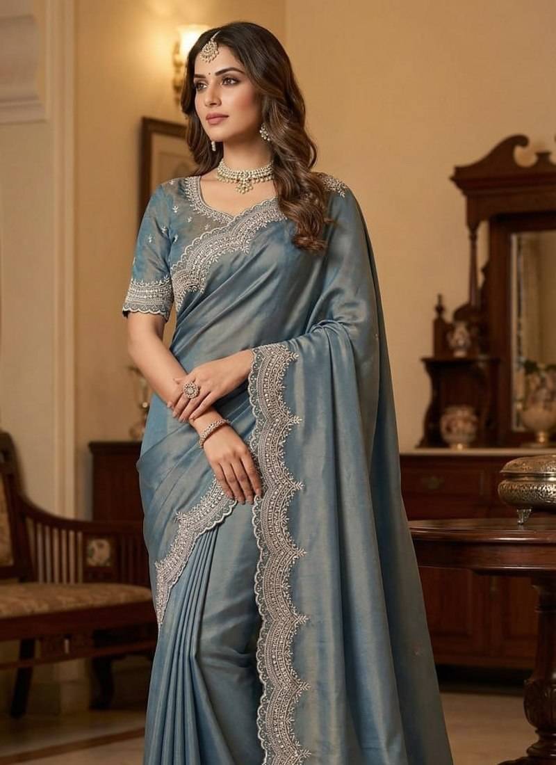 sky blue color embroidery work with cut work border and havy daimond work silk blend saree