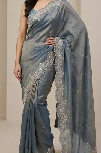 sky blue color embroidery work with cut work border and havy daimond work silk blend saree