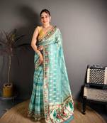 skyblue color premium cotton blend flower-peacock printed sarees