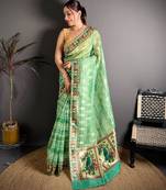green color premium cotton blend flower-peacock printed sarees