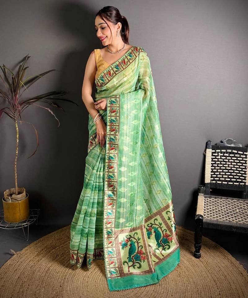 green color premium cotton blend flower-peacock printed sarees