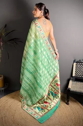 green color premium cotton blend flower-peacock printed sarees