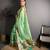 green color premium cotton blend flower-peacock printed sarees