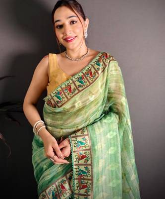green color premium cotton blend flower-peacock printed sarees 4