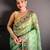 green color premium cotton blend flower-peacock printed sarees