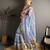 blue color premium cotton blend flower-peacock printed sarees