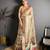 beige color premium cotton blend flower-peacock printed sarees