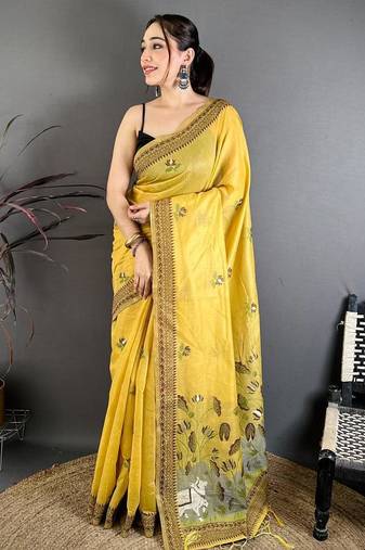 yellow color muga cotton blend woven with flower printed saree