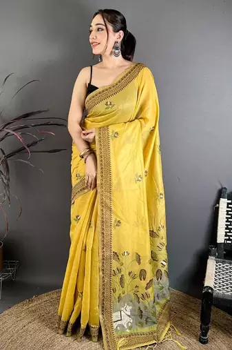 yellow color muga cotton blend woven with flower printed saree