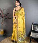 yellow color muga cotton blend woven with flower printed saree