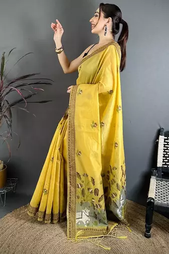 yellow color muga cotton blend woven with flower printed saree