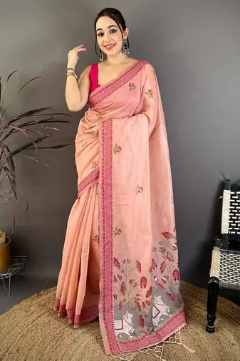 pink color muga cotton blend woven with flower printed saree