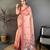 pink color muga cotton blend woven with flower printed saree