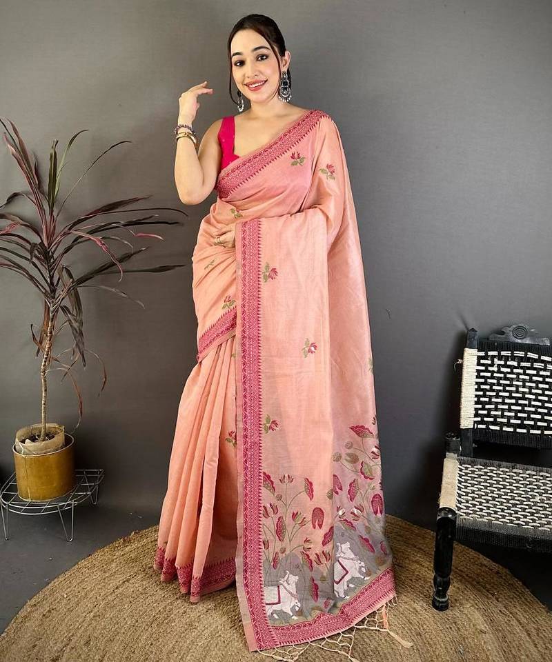 pink color muga cotton blend woven with flower printed saree