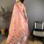 pink color muga cotton blend woven with flower printed saree