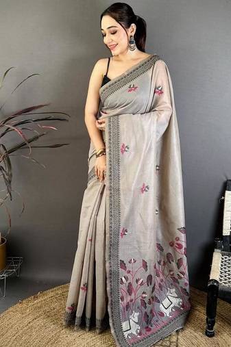 grey color muga cotton blend woven with flower printed saree