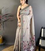 grey color muga cotton blend woven with flower printed saree