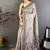 grey color muga cotton blend woven with flower printed saree
