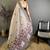 grey color muga cotton blend woven with flower printed saree