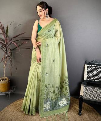 green color muga cotton blend woven with flower printed saree 1