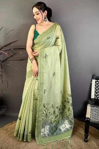 green color muga cotton blend woven with flower printed saree