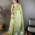 green color muga cotton blend woven with flower printed saree